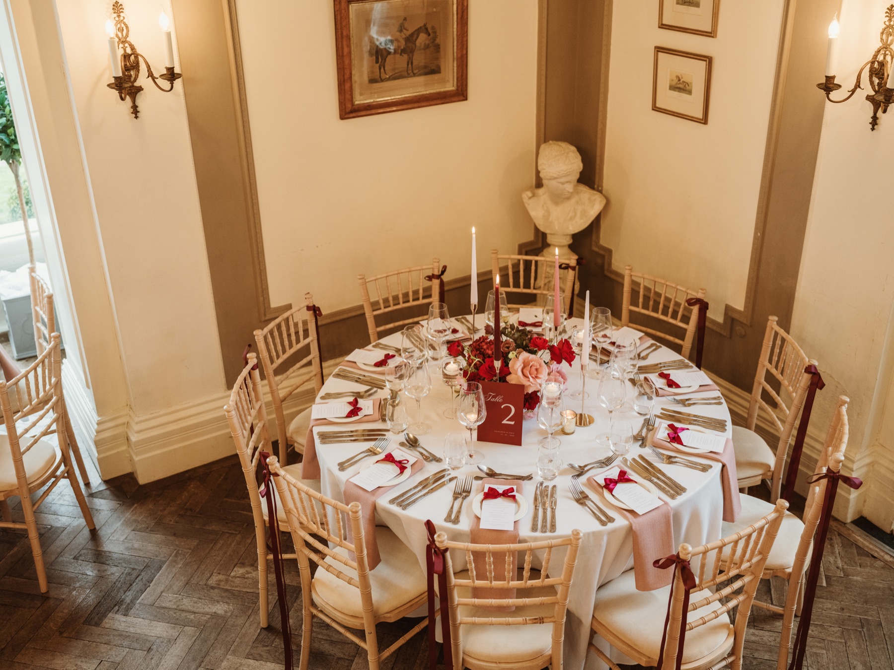 A round dining table set for an evening