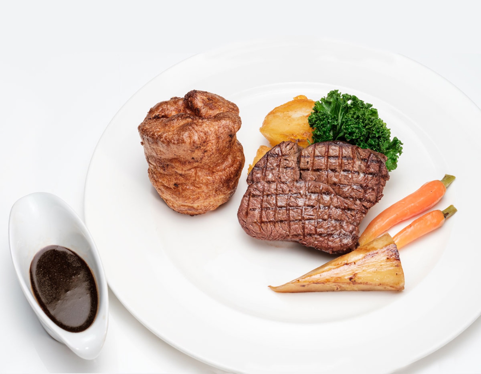 A signature main course from the Glewstone kitchen — roast fillet of Hereford beef with Yorkshire pudding, roast potatoes and seasonal vegetables